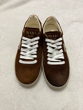 Prada Brown Suede Low-Top Sneakers with White Laces and Gold Accents